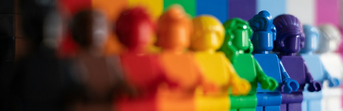 A rainbow array of Lego minifigs.
