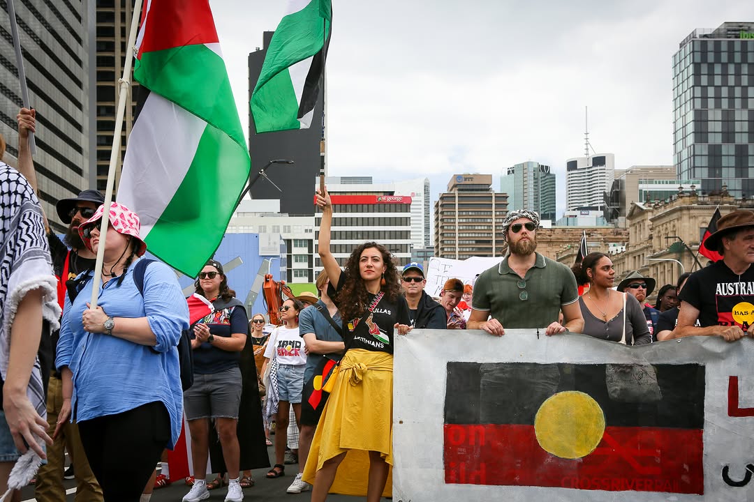 Remah Naji with community at march