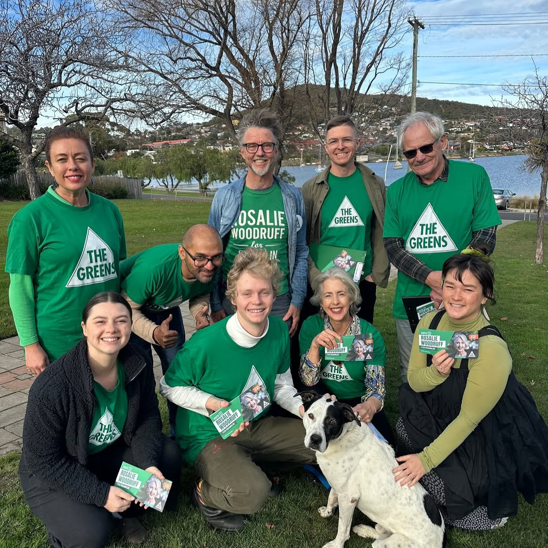 Rosalie Woodruff and Tasmanian Greens volunteers smiling