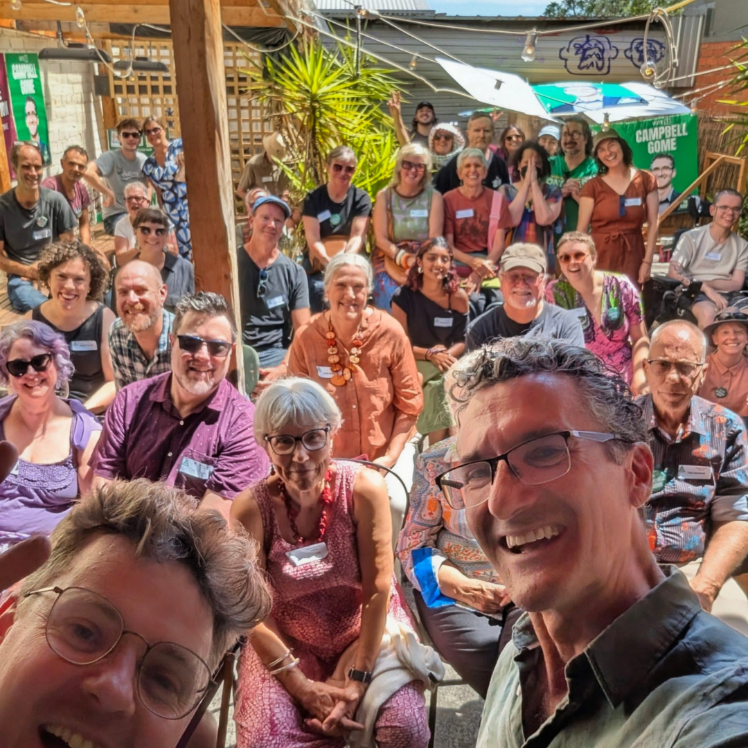 Campbell Gome, Tom Ballard and supports smiling taking a selfie at the Northcote launch