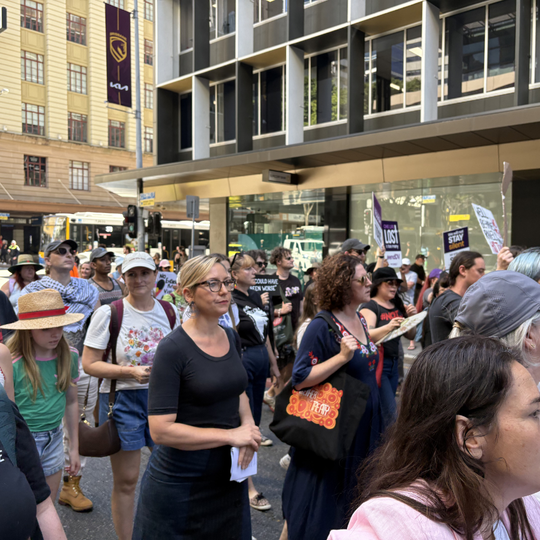 Image of Larissa Waters and crowd at protest 