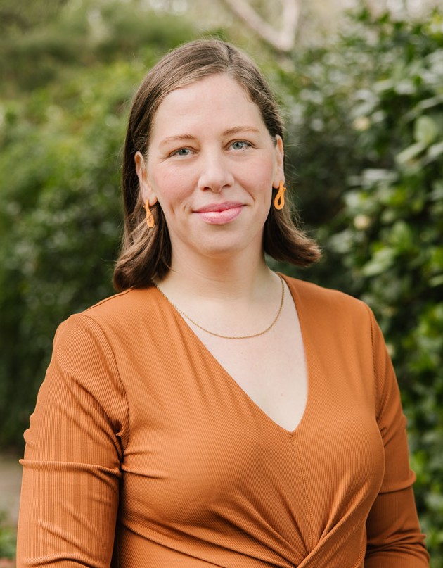 Image of Genevieve Dawson-Scott with blurred garden background